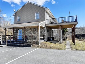 Exterior of the riverside apartment, just steps from riverfront trails and downtown shops.