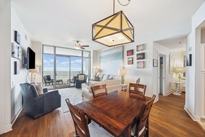 Dining area sits four with additional seating at breakfast bar.