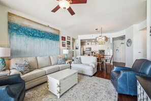 This open-concept layout offers plenty of space to relax or entertain after a day at the beach.