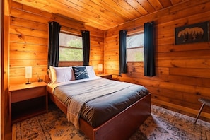 Unwind in the peaceful master bedroom with a full-size bed and a 43" smart TV for late-night movies or morning news.