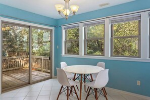 The adjacent Dining Area with seating for four provides the perfect spot to enjoy a home-cooked meal.