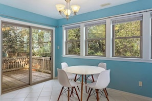 The adjacent Dining Area with seating for four provides the perfect spot to enjoy a home-cooked meal.