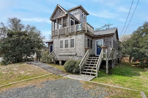 Escape to the charming coastal retreat of this 2-bedroom, 2-bathroom bungalow-style home located in Frisco, NC, perfect for a relaxing, beach-centered vacation