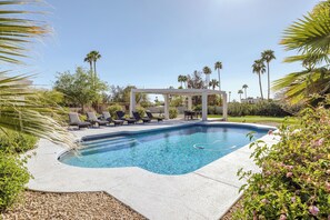Sparkling pool surrounded by mini golf course