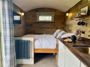 The Shepherds Snug, Powerstock: Your cosy 5' king-size bed invites you to relax