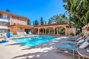 Building has Pool Area and Outdoor Seating Areas