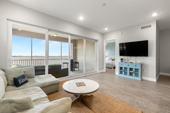 Catch your favorite shows or simply soak in the waterfront views—our living room offers the best of both worlds.