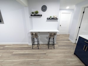 Foldable table that can use be used as work station or eating area