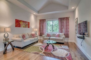 Living Room: 📺 Spacious, sunlit, and perfect for unwinding after a day of exploring.