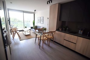 Bright and airy living space with modern decor, perfect for relaxation and enjoying stunning views.
