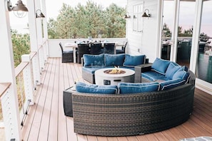 Cozy up around the fire pit and enjoy the calm of coastal evenings—this is outdoor living at its best.