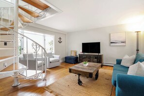 Living room area under 2nd Floor lofted bedroom