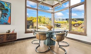 Grand Dining Room โ Take in the splendor of aspen-covered mountains while dining in natural beauty. Relish every meal with breathtaking views that become the perfect backdrop for laughter and conversation.