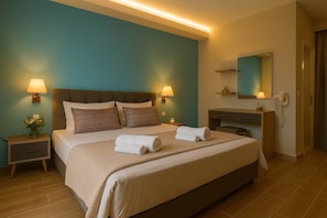 Double bedroom with ambient lighting – Warmly lit bedroom featuring a double bed.