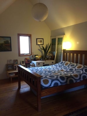 Main bedroom queen bed. Leading to front balcony.
Single mattress under bed if needed for smaller child. Travel cot also available if requested.