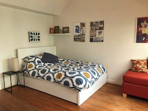 Second double room leading to large back deck. Upstairs.