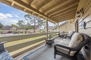 Lounge the day away in the fresh air on the breezy balcony