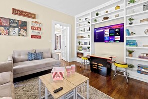 Game/ Theatre Room with a PAC-MAN video game machine