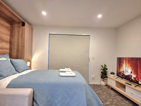 Queen bed and smart TV