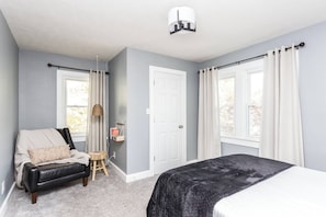 Primary bedroom suite includes a reading nook, large closet and full ensuite bathroom with walk in shower.
