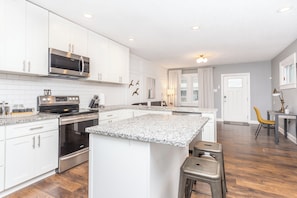 Open concept kitchen/living room area.
