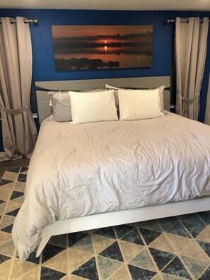 King Bed and 50" Smart TV in Master Bedroom