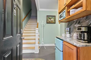 A warm welcome awaits—step into a space where charm and comfort begin at the front door.