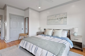 Unwind in the spacious primary suite, complete with a king bed, smart TV, and calming ambiance—your private retreat.
