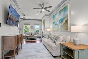 Settle in and stream your favorites on the large smart TV—this cozy living room is made for movie nights and laid-back evenings.