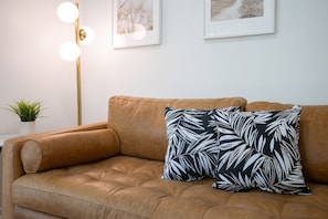 Stretch out and stay awhile—this cozy leather sofa is made for afternoon naps, movie nights, and everything in between.