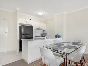 No need to eat out with a modern kitchen and dining space