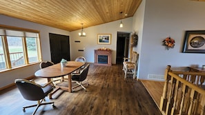 Open concept living space with many dining areas on main level.