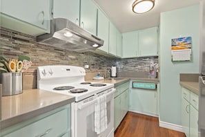 Full Kitchen with oven/stove, Keurig coffee maker and starter set of K-Cups.