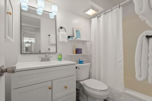Full bathroom with tub/shower combo. Shampoo, conditioner and body wash provided