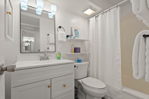 Full bathroom with tub/shower combo. Shampoo, conditioner and body wash provided