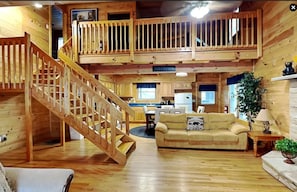 Living Room with High Ceilings and Sleeper Sofa