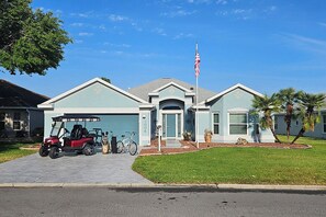 4 person golf cart, golf clubs, and bicycle are included.