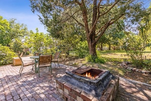Enjoy Evenings Dining Under the Stars by the Fire on Your Patio
