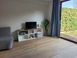 TV and partial garden view