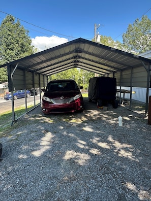 Shaded pull through parking for your boat and large fish cleaning table