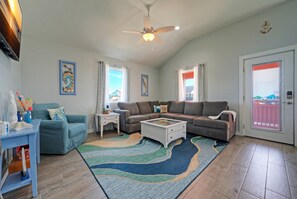 Living room with sleeper sofa.