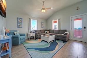 Living room with sleeper sofa.