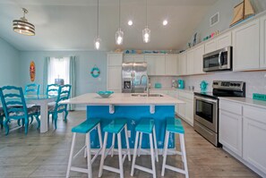 Step inside to a charming interior filled with colorful decor.
