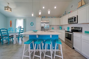 Step inside to a charming interior filled with colorful decor.