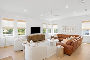 Open-concept living room with ample natural light.