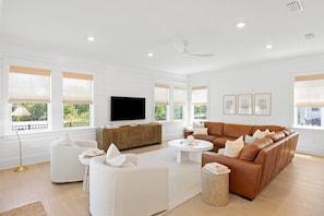 Open-concept living room with ample natural light.