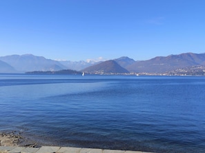 Sky, Blue, Water, Water Resources, Mountainous Landforms, Body Of Water, Mountain, Horizon, Coastal And Oceanic Landforms, Hill