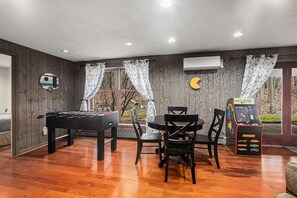 Try Your Hand at a Game of Packman or Foosball in the Lower Level Family Game Room