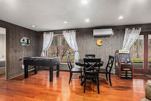 Try Your Hand at a Game of Packman or Foosball in the Lower Level Family Game Room