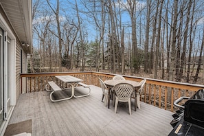 Summer Cookouts Taste Better on Summerwood Cottage`s Backyard Deck